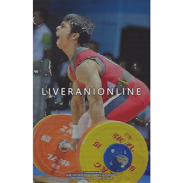 SHENZHEN, Aug. 14, 2011 Withawat Kritphet of Thailands competes during the final of the men\'s 62kg of weightlifting at the 26th Summer Universiade in Shenzhen, a city of south China\'s Guangdong Province, Aug. 14, 2011. Withawat Kritphet took the bronze with 283kg in total. (/Wang Song) (wll)