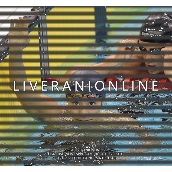 SHENZHEN, Aug. 14, 2011 Ryosuke Irie of Japan celebrates after the final of the men\'s 200m backstroke at the 26th Summer Universiade in Shenzhen, a city of south China\'s Guangdong Province, Aug. 14, 2011. Ryosuke Irie claimed the title with 1:56.01. (/Yang Shiyao) (wll)