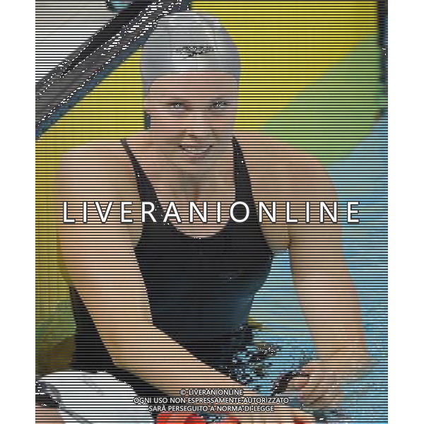 SHENZHEN, Aug. 14, 2011 Lauren Boyle of New Zealand reacts after the final of the women\'s 800m freestyle at the 26th Summer Universiade in Shenzhen, a city of south China\'s Guangdong Province, Aug. 14, 2011. Lauren Boyle claimed the title with 8:26.30. (/Yang Shiyao) (wll)