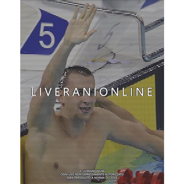 SHENZHEN, Aug. 14, 2011 Laszlo Cseh of Hungary celebrates after winning the final of the men\'s 200m butterfly at the 26th Summer Universiade in Shenzhen, a city of south China\'s Guangdong Province, Aug. 14, 2011. Laszlo Cseh claimed the title with 1 minute and 55.87 seconds. (/Liang Xu) (wll)