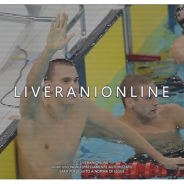 SHENZHEN, Aug. 14, 2011 Laszlo Cseh of Hungary waves to the spectators after winning the final of the men\'s 200m butterfly at the 26th Summer Universiade in Shenzhen, a city of south China\'s Guangdong Province, Aug. 14, 2011. Laszlo Cseh claimed the title with 1 minute and 55.87 seconds. (/Yang Shiyao) (wll)