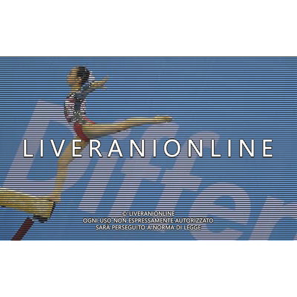 SHENZHEN, Aug. 15, 2011 Minobe Yu of Japan competes during balance beam competion in women\'s individual all round final of artistic gymnastics at the 26th Summer Universiade in Shenzhen, a city of south China\'s Guangdong Province, Aug. 15, 2011. Minobe Yu took the silver medal with a total of 56.100 points. (/Gong Lei)(kh)