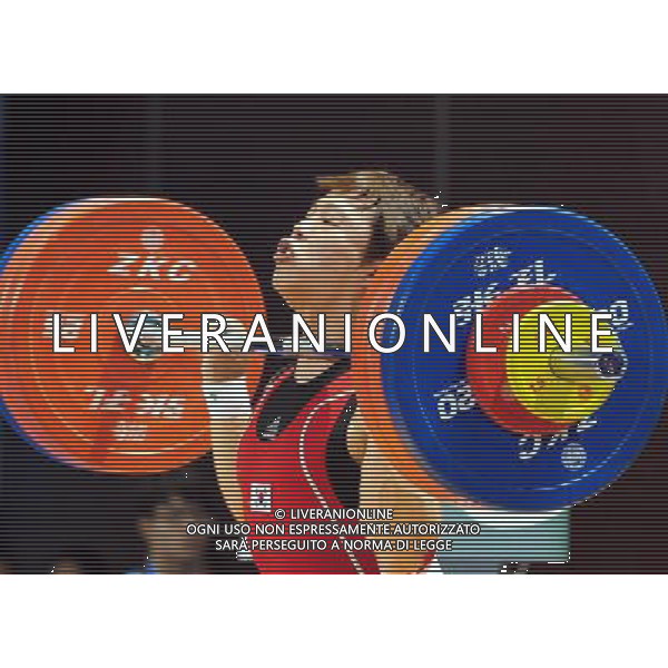 SHENZHEN, Aug. 14, 2011 Won Jeong Sik of South Korea competes during the men\'s 69kg final of weightlifting at the 26th Summer Universiade in Shenzhen, a city of south China\'s Guangdong Province, Aug. 15, 2011. Won Jeong Sik won the silver medal with a total of 318kg. (/Wang Song) (kh)