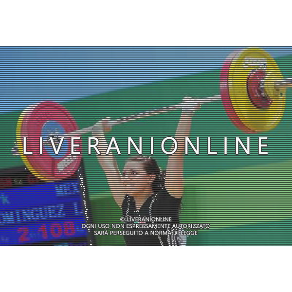 SHENZHEN, Aug. 15, 2011 Lara Monica Patricia Dominguez of Mexico competes during the women\'s 58kg final of weightlifting at the 26th Summer Universiade in Shenzhen, a city of south China\'s Guangdong Province, Aug. 15, 2011. Lara Monica Patricia Dominguez took the bronze medal with a total of 201kg. (/Wang Song) (kh)