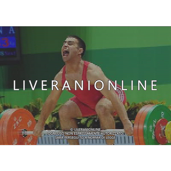 (110815) -- SHENZHEN, Aug. 15, 2011 () -- Aghasyan Aghasi of Armenia competes during the men\'s 77kg weightlifting final at the 26th Summer Universiade in Shenzhen, a city of south China\'s Guangdong Province, Aug. 15, 2011. Aghasyan Aghasi won the gold with a total of 337kg. (/Wang Song) (kh)