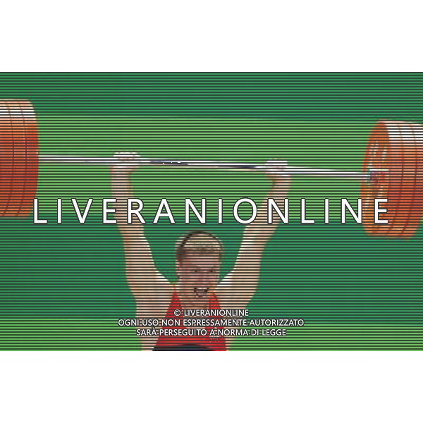 (110815) -- SHENZHEN, Aug. 15, 2011 () -- Kharchenko Victor of Russia competes during the men\'s 77kg weightlifting final at the 26th Summer Universiade in Shenzhen, a city of south China\'s Guangdong Province, Aug. 15, 2011. Kharchenko Victor took the bronze medalist with a total of 331kg. (/Wang Song) (kh)