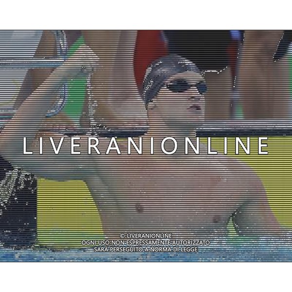 (110815) -- SHENZHEN, Aug. 15, 2011 () -- Robert Savulich of the United States celebrates after his team winning the men\'s 4X100m freetyle relay final of swimming at the 26th Summer Universiade in Shenzhen, a city of south China\'s Guangdong Province, Aug. 15, 2011. The team of the U.S. claimed the gold of the event with a time of 3 minutes 15.84 seconds. (/Chen Jianli)