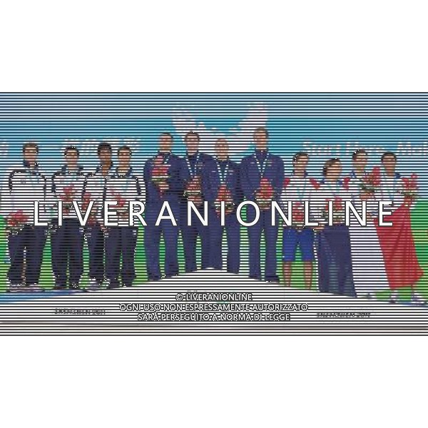(110815) -- SHENZHEN, Aug. 15, 2011 () -- Gold medalists of the United States (5th L to 8th L), silver medalists of Brazil (1st L to 4th L) and bronze medalists of France (1st R to 4th R) pose for group pictures during the awarding ceremony for men\'s 4X100m freetyle relay of swimming at the 26th Summer Universiade in Shenzhen, a city of south China\'s Guangdong Province, Aug. 15, 2011. The team of the U.S. claimed the gold of the event with a time of 3 minutes 15.84 seconds. (/Chen Jianli)