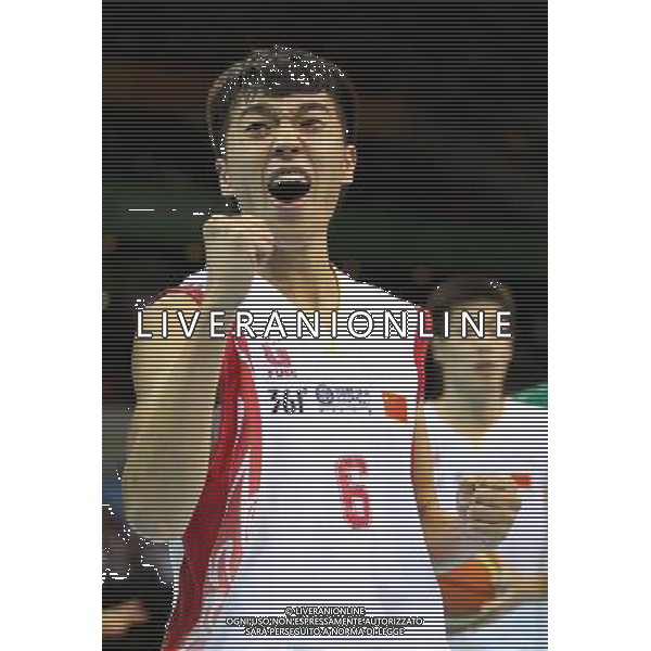 (110815) -- SHENZHEN, Aug. 15, 2011 () -- Zeng Lingxu of China celebrates a score during the preliminary group A bastkeball match against Brazil at the 26th Summer Universiade in Shenzhen, a city of south China\'s Guangdong Province, Aug. 15, 2011. China lost 70-97. (/Meng Yongmin)