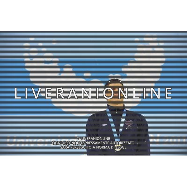 (110815) -- SHENZHEN, Aug. 15, 2011 () -- Michael Klueh of the United States reacts during the awarding ceremony for men\'s 800m freetyle of swimming at the 26th Summer Universiade in Shenzhen, a city of south China\'s Guangdong Province, Aug. 15, 2011. Klueh claimed the gold of the event with a time of 7 minutes 52.31 seconds. (/Liang Xu)