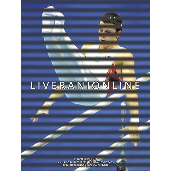 (110815) -- SHENZHEN, Aug. 15, 2011 () -- Mykola Kuksenkov of Ukraine performs during the parallel bars competion in men\'s individual all-round final of artistic gymnastics at the 26th Summer Universiade in Shenzhen, a city of south China\'s Guangdong Province, Aug. 15, 2011. Kuksenkov won with a total of 89.050 points. (/Gong Lei)(kh)