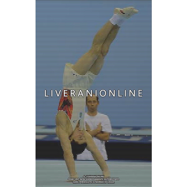 (110815) -- SHENZHEN, Aug. 15, 2011 () -- Mykola Kuksenkov of Ukraine performs during the floor competion in men\'s individual all-round final of artistic gymnastics at the 26th Summer Universiade in Shenzhen, a city of south China\'s Guangdong Province, Aug. 15, 2011. Kuksenkov won with a total of 89.050 points. (/Lin Yiguang)(kh)