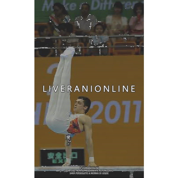 (110815) -- SHENZHEN, Aug. 15, 2011 () -- Mykola Kuksenkov of Ukraine performs during the parallel bars competion in men\'s individual all-round final of artistic gymnastics at the 26th Summer Universiade in Shenzhen, a city of south China\'s Guangdong Province, Aug. 15, 2011. Kuksenkov won with a total of 89.050 points. (/Lin Yiguang)(kh)