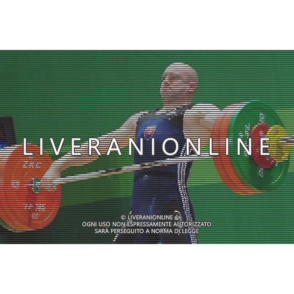 (110815) -- SHENZHEN, Aug. 15, 2011 () -- Tkac Richard of Slovenia competes during the men\'s 77kg weightlifting final at the 26th Summer Universiade in Shenzhen, a city of south China\'s Guangdong Province, Aug. 15, 2011. Tkac Richard ranked the 4th with a total of 330kg. (/Wang Song) (kh)