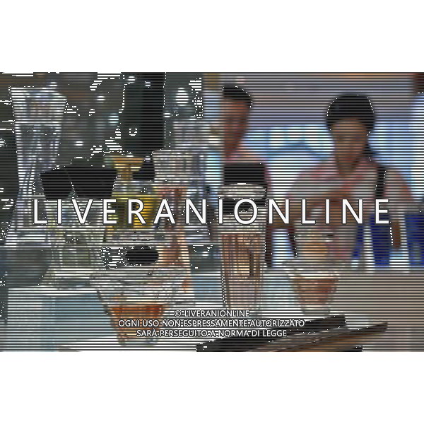 (110814) -- SANYA, Aug. 14, 2011 () -- Customers choose perfumes at a tax-free shop in Sanya, south China\'s Hainan Province, Aug. 12, 2011. The offshore tax-free scheme kicked off on a trial basis across Hainan from April 20, and was formally launched on May 1. Up to Aug. 10, the tax-free shop in Sanya has received over 1.3 million customers and more than 340,000 deals have been made. (/Hou Jiansen) (lj)(hdt)