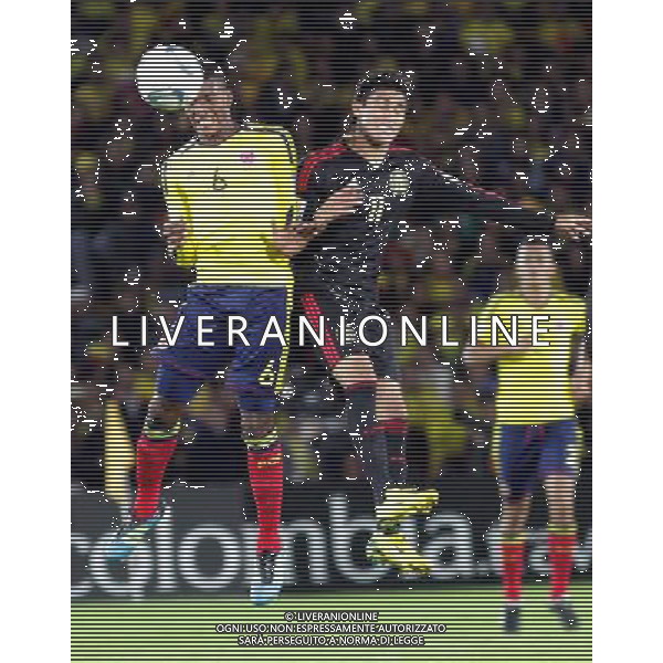 (110814) -- CARTAGENA, Aug. 14, 2011 () -- Colombia\'s Didier Moreno (L) vies for the ball with Ulises Davila (R) of Mexico, during their quarterfinals at the U-20 World Championship in Cartagena, Colombia, on Aug. 13, 2011. (/Str) (rc)