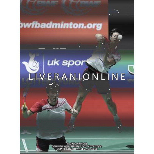 (110813) -- LONDON, Aug. 13, 2011 () -- Ko Sung Hyun (R) and Yoo Yeon Seong of South Korea celebrate after winning their semifinal of men\'s doubles against Mohammad Ahsan and Bona Septano of Indonesia in 2011 Badminton World Championships at Wembley Arena, London, Britain, Aug. 13, 2011. Ko and Yoo won 2-0. (/Zeng Yi)(wll)
