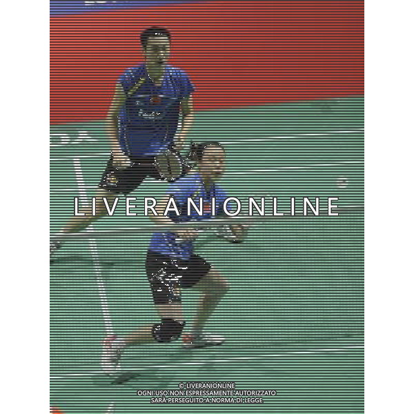 (110813) -- LONDON, Aug. 13, 2011 () -- China\'s Zhang Nan (L) and Zhao Yunlei return the shuttlecock during their semifinal of mixed doubles against teammates Xu Chen and Ma Jin in 2011\'s Badminton World Championships at Wembley Arena, London, Britain, Aug. 13, 2011. Zhang and Zhao entered the final as Xu and Ma retired due to Ma\'s injury. (/Zeng Yi)(wll)