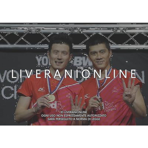 LONDON, Aug. 14, 2011 China\'s Cai Yun (L) and Fu Haifeng react during the awarding ceremony for men\'s double in 2011 Badminton World Championships at Wembley Arena, London, Britain, Aug. 14, 2011. Cai and Fu claimed the title after defeated Ko Sung Hyun and Yoo Yeon Seong of South Korea by 2 0 in the final. (/Zeng Yi)(kh)