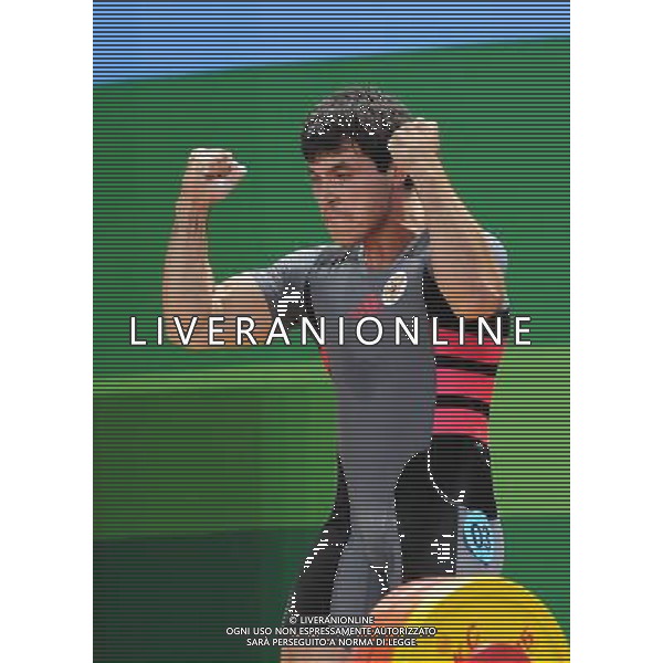 (110816) -- SHENZHEN, Aug. 16, 2011 () -- Kiree Rinat of Russia celebrates during the men\'s 85kg weightlifting competition at the 26th Summer Universiade in Shenzhen, a city of south China\'s Guangdong Province, Aug. 16, 2011. Kiree Rinat claimed the gold medal of the event with a total of 365kg. (/Wang Song)