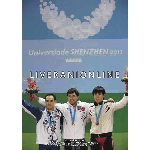 (110816) -- SHENZHEN, Aug. 16, 2011 () -- Gold medalist Kiree Rinat of Russia (C), silver medalist Zhang Shichong of China (L) and bronze medalist Ryu Jun Ho of South Korea pose at the awarding ceremony of the men\'s 85kg weightlifting competition at the 26th Summer Universiade in Shenzhen, a city of south China\'s Guangdong Province, Aug. 16, 2011. (/Wang Song)