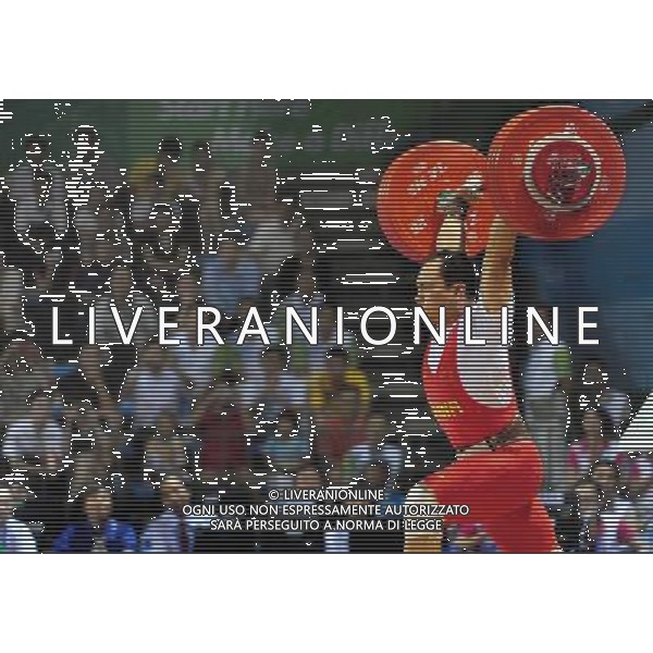 (110816) -- SHENZHEN, Aug. 16, 2011 () -- Zhang Shichong of China competes during the men\'s 85kg weightlifting competition at the 26th Summer Universiade in Shenzhen, a city of south China\'s Guangdong Province, Aug. 16, 2011. Zhang Shichong claimed the silver medal of the event with a total of 353kg. (/Wang Song)