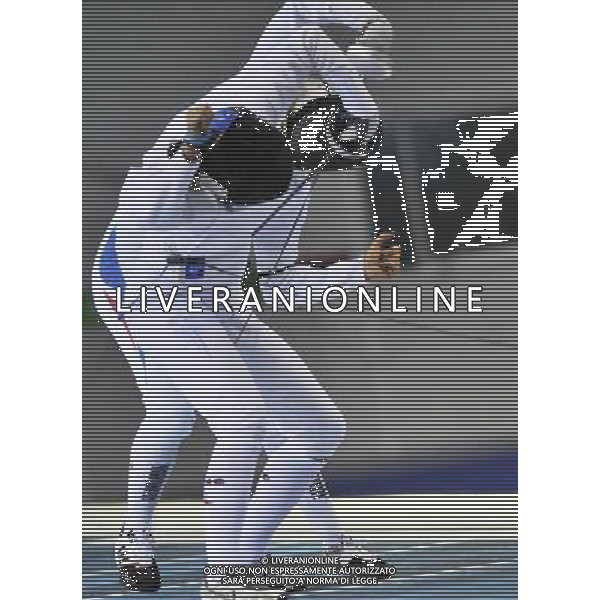 (110816) -- SHENZHEN, Aug. 16, 2011 () -- Marie Favolle of France (rear) competes during the women\'s epee team final of fencing event against the United States at the 26th Summer Universiade, in Shenzhen, a city of south China\'s Guangdong Province, Aug. 16, 2011. France defeated US 45-39 to won the gold medal.(/Wang Haofei)(bxf)
