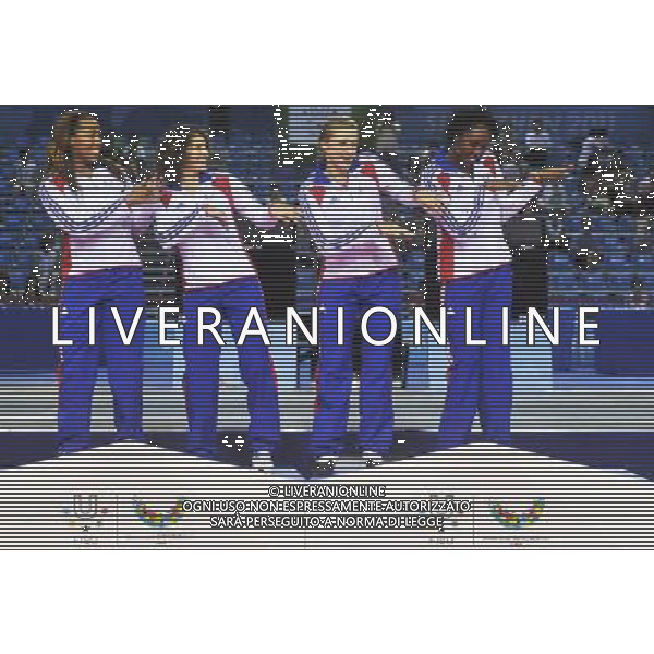 (110816) -- SHENZHEN, Aug. 16, 2011 () -- Gold medalists team of France dance during the awarding ceremony for the women\'s epee team of fencing event at the 26th Summer Universiade, in Shenzhen, a city of south China\'s Guangdong Province, Aug. 16, 2011. (/Wang Haofei)(bxf)