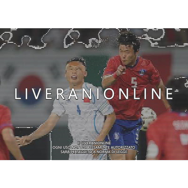 (110816) -- SHENZHEN, Aug. 16, 2011 () -- Lu Bin of China (L) vies against Lee Taig Ki of South Korea during their men\'s preliminary match of football event at the 26th Summer Universiade, in Shenzhen, a city of south China\'s Guangdong Province, Aug. 16, 2011. The match ended in a 0-0 draw. (/Li Ga)(bxf)