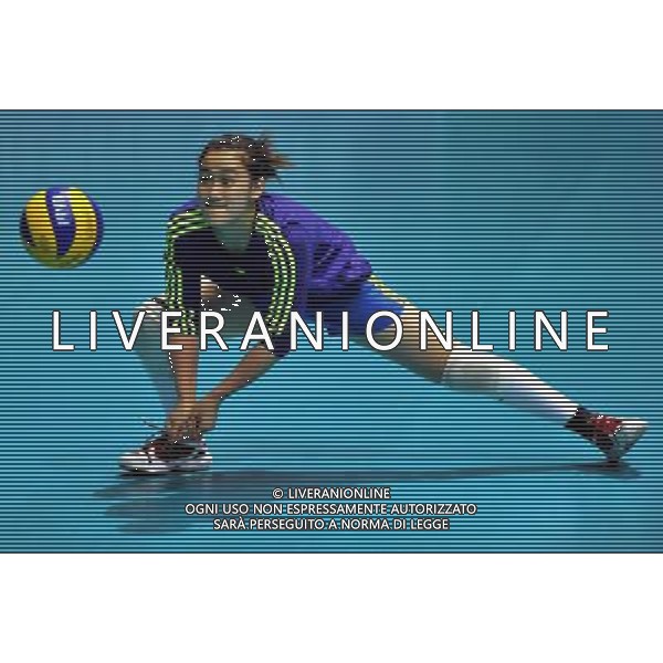 (110816) -- HONG KONG, Aug. 16, 2011 () -- Shan Danna, member of Chinese women\'s volleyball team, saves the ball during the training session in Hong Kong, south China, Aug. 16, 2011. Chinese women\'s volleyball team held a training session at Hong Kong Coliseum on Tuesday for the women\'s World Grand Prix Hong Kong session which will be held from Aug. 19 to 21. (/Lo Ping Fai)