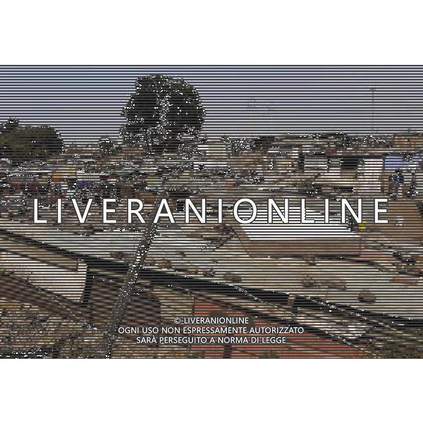 JOHANNESBURG, Aug. 16, 2011 Residents are seen at a slum in Samampelo, Johannesburg, South Africa, Aug. 14, 2011. Over 15,000 people live in this slum, most of whom live on hard labour or small business. (/Li Qihua) (msq)