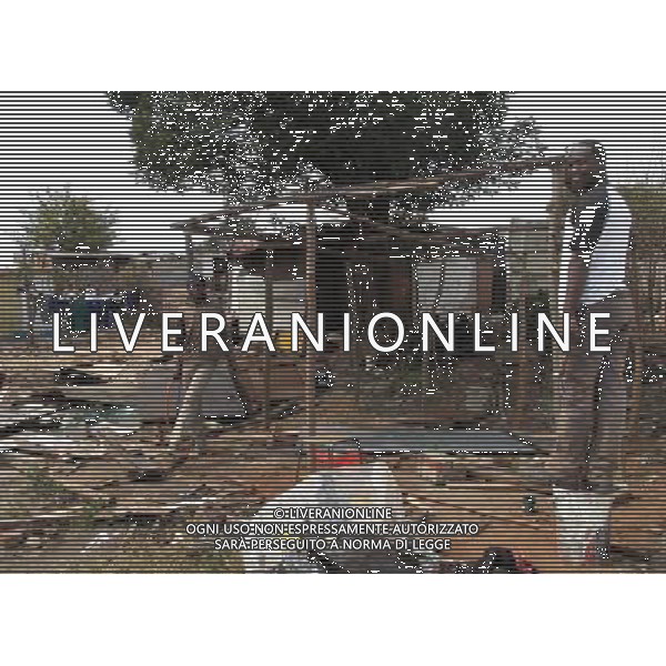 JOHANNESBURG, Aug. 16, 2011 Residents build their home in a slum in Samampelo, Johannesburg, South Africa, Aug. 14, 2011. Over 15,000 people live in this slum, most of whom live on hard labour or small business. (/Li Qihua) (msq)