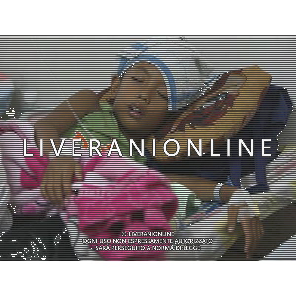 MANILA, Aug. 16, 2011 A boy suffering from the dengue disease sleeps inside the Quirino Memorial Medical Center in Quezon City, Philippines, on August 16, 2011. (/Rouelle Umali)