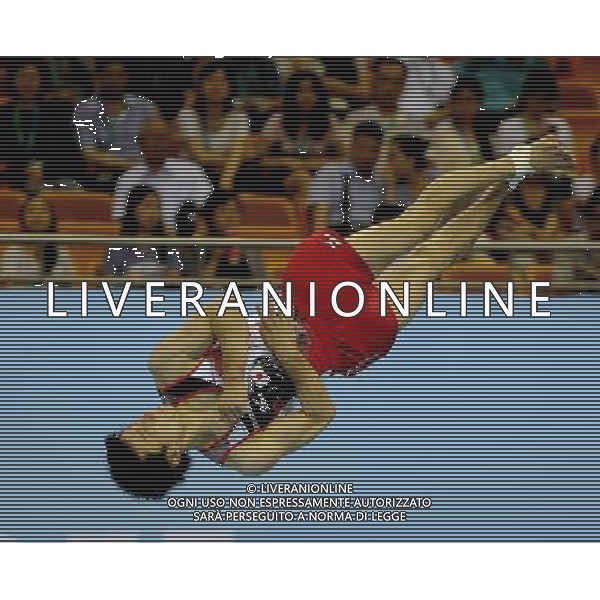 SHENZHEN, Aug. 16, 2011 Yamamoto Shoichi of Japan competes during the men\'s floor exercise final of artistic gymnastic event at the 26th Summer Universiade, in Shenzhen, a city of south China\'s Guangdong Province, Aug. 16, 2011. Yamamoto Shoichi won the bronze medal with 15.000 points. (/Lin Yiguang)(bxf)