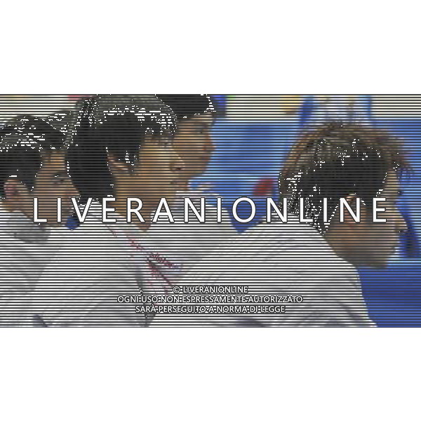 SHENZHEN, Aug. 16, 2011 China\'s Ouyang , He Wei, Hou Mengjun and Xiao Yewei (from L to R) react after the men\'s sabre team classification 5 8 match of fencing event between China and the United States at the 26th Summer Universiade, in Shenzhen, a city of south China\'s Guangdong Province, Aug. 16, 2011. China lost 41 45. (/Wang Haofei)(lm)