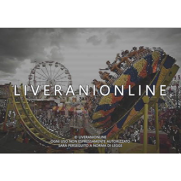 (110817) -- BRISBANE, Aug. 17, 2011 () -- People play at the entertainment park during the 134th Royal Queensland Show in Brisbane, Australia, on Aug. 17, 2011. (/Bai Xue) (nxl)