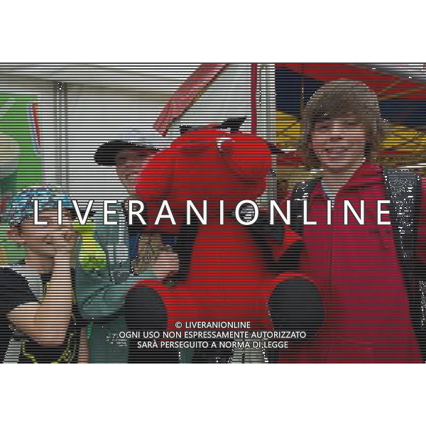 (110817) -- BRISBANE, Aug. 17, 2011 () -- Visitors showcase the prizes they won at the entertainment park during the 134th Royal Queensland Show in Brisbane, Australia, on Aug. 17, 2011. (/Bai Xue) (nxl)