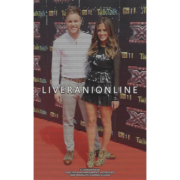 Olly Murs and Caroline Flack at the X Factor press launch 2011 at the O2, Greenwich, London 17 August 2011 picture by Marc Larkin/Photoshot.