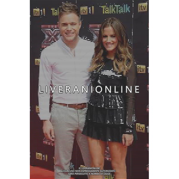 Olly Murs and Caroline Flack at the X Factor press launch 2011 at the O2, Greenwich, London 17 August 2011 picture by Marc Larkin/Photoshot.