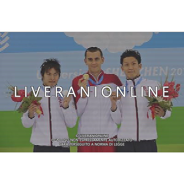 (110816) -- SHENZHEN, Aug. 16, 2011 () -- Gold medalist Laszlo Cseh of Hungary (C), silver medalist Yuya Horihata of Japan (L), and bronze medalist Yuma Kosaka of Japan celebrates at the awarding cermony of the men\'s 200m individual medley of swimming at the 26th Summer Universiade in Shenzhen, a city of south China\'s Guangdong Province, Aug. 16, 2011. (/Liang Xu)