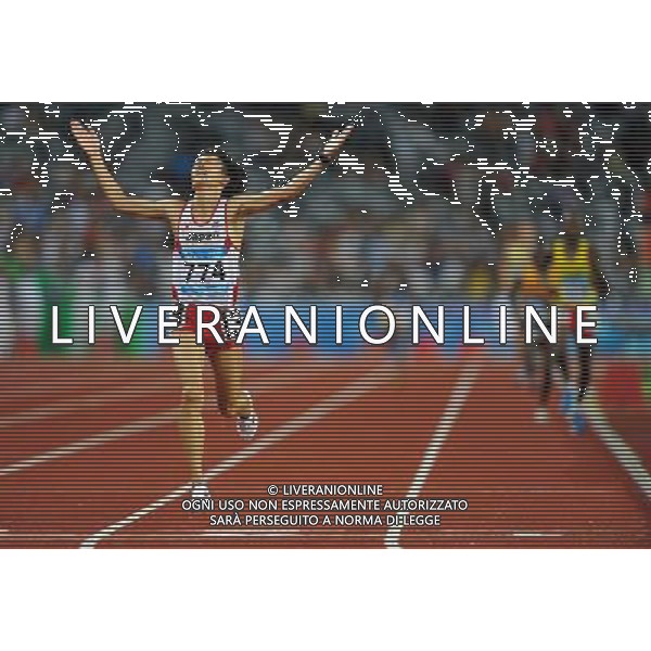 (110817) -- SHENZHEN, Aug. 17, 2011 () -- Osako Suguru of Japan celebrates during the final of the men\'s 10,000m of athletics at the 26th Summer Universiade in Shenzhen, a city of south China\'s Guangdong Province Aug. 17, 2011. Osako Suguru claimed the title with 28:42.83. (/Gong Lei)(wll)