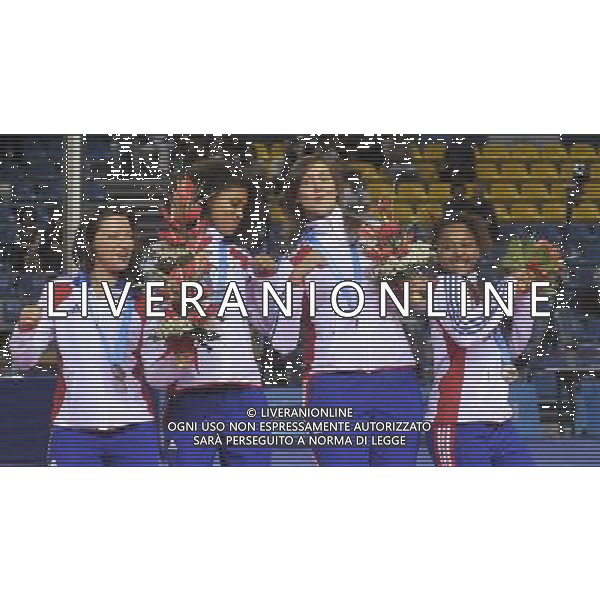 (110817) -- SHENZHEN, Aug. 17, 2011 () -- Bronze medalists team France celebrate on the podium during the awarding ceremony for the women\'s foil team of fencing at the 26th Summer Universiade in Shenzhen, a city of south China\'s Guangdong Province Aug. 17, 2011. (/Wang Haofei)(wll)