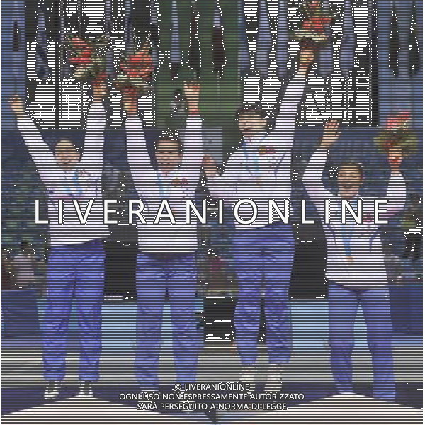 (110817) -- SHENZHEN, Aug. 17, 2011 () -- Gold medalistas Team Russia celebrate on the podium during the awarding ceremony for the women\'s foil team of fencing at the 26th Summer Universiade in Shenzhen, a city of south China\'s Guangdong Province Aug. 17, 2011. (/Wang Haofei)(wll)