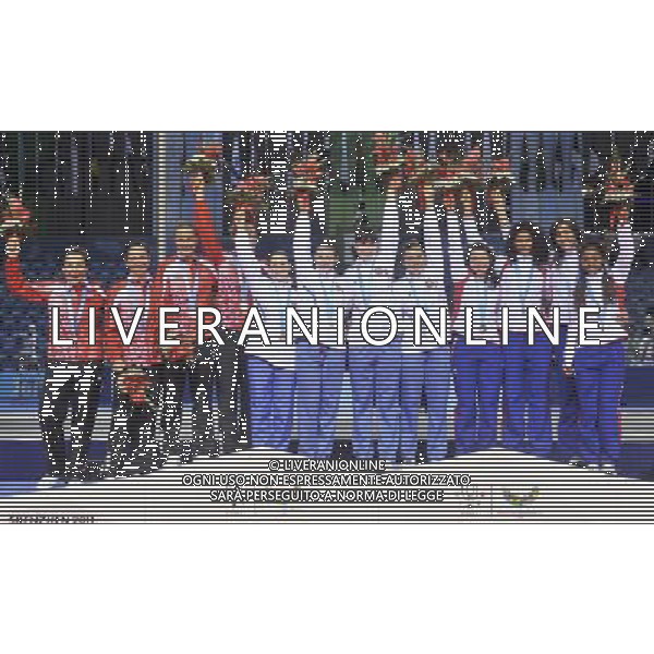 (110817) -- SHENZHEN, Aug. 17, 2011 () -- Gold medalistas Team Russia (C), silver medalists team Poland (L) and bronze medalists team France celebrate on the podium during the awarding ceremony for the women\'s foil team of fencing at the 26th Summer Universiade in Shenzhen, a city of south China\'s Guangdong Province Aug. 17, 2011. (/Wang Haofei)(wll)