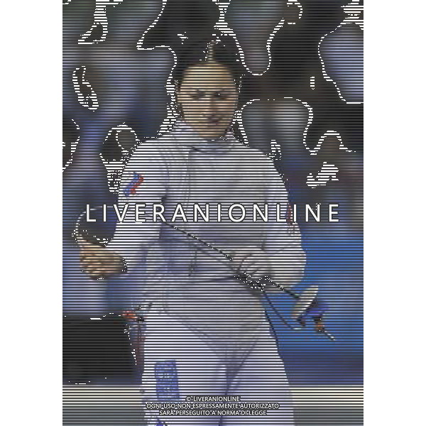 (110817) -- SHENZHEN, Aug. 17, 2011 () -- Julia Biryukova of Russia reacts during the gold medal match of women\'s foil team of fencing at the 26th Summer Universiade in Shenzhen, a city of south China\'s Guangdong Province Aug. 17, 2011. Team Russia claimed the title by beating team Poland with 45-32. (/Wang Haofei)(wll)