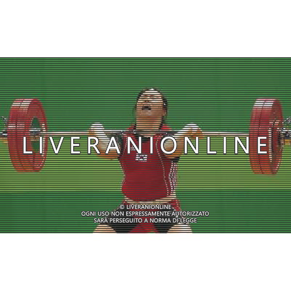 (110817) -- SHENZHEN, Aug. 17, 2011 () -- Lee Ae Ra of South Korea competes during the women\'s 75kg weightlifting competition at the 26th Summer Universiade in Shenzhen, a city of south China\'s Guangdong Province, Aug. 17, 2011. Petanang Khanittha claimed the title of the event with a total of 236kg. Lee Ae Ra won the bronze medal of the event with a total of 226kg. (/Wang Song)
