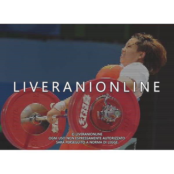 (110817) -- SHENZHEN, Aug. 17, 2011 () -- Li Yang of China competes during the women\'s 75kg weightlifting competition at the 26th Summer Universiade in Shenzhen, a city of south China\'s Guangdong Province, Aug. 17, 2011. Petanang Khanittha claimed the title of the event with a total of 236kg. Li Yang won the silver medal of the event with a total of 234kg. (/Wang Song)
