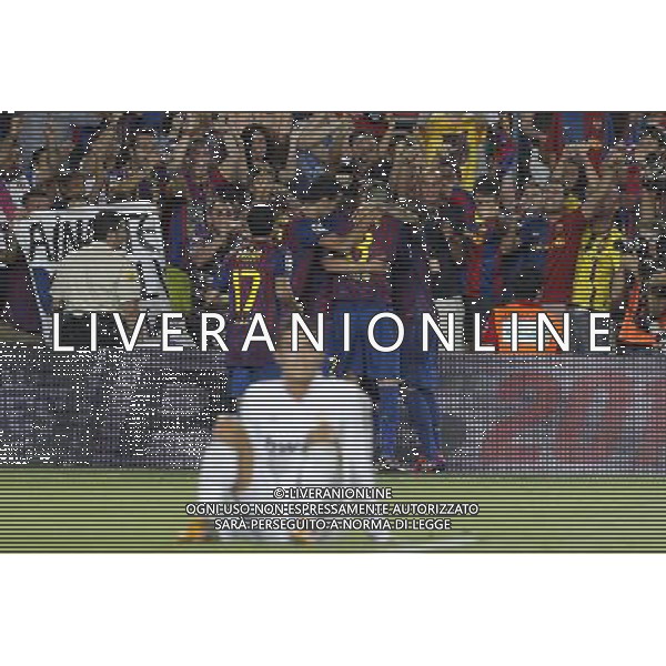 FC Barcelona\'s players celebrates goal in presence of Real Madrid\'s Cristiano Ronaldo dejected during Spanish Supercup 2nd match.August 17,2011. Photo: Acero / Alter / ALFAQUI Photo: Acero / Alter / ALFAQUI