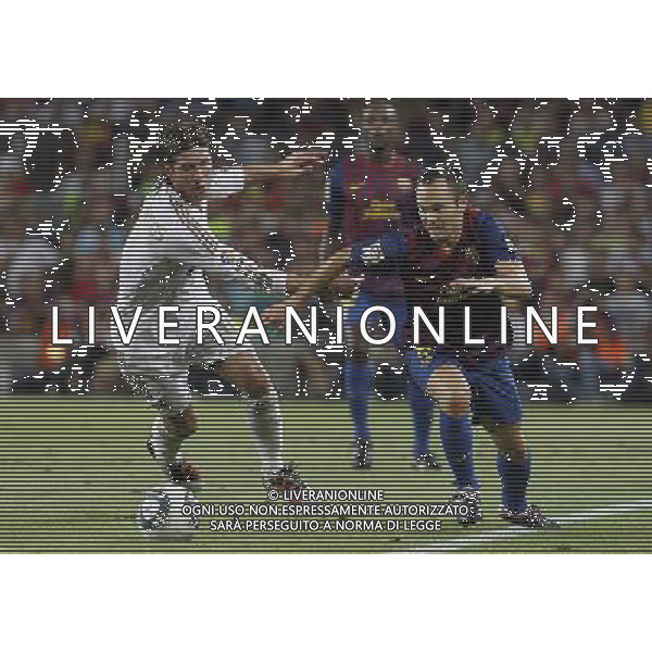 FC Barcelona\'s Andres Iniesta (r) and Real Madrid\'s Sergio Ramos during Spanish Supercup 2nd match.August 17,2011. Photo: Acero / Alter / ALFAQUI Photo: Acero / Alter / ALFAQUI