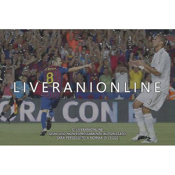 FC Barcelona\'s Andres Iniesta celebrate goal in presence of Real Madrid\'s Pepe (r) dejected during Spanish Supercup 2nd match.August 17,2011. Photo: Acero / Alter / ALFAQUI Photo: Acero / Alter / ALFAQUI